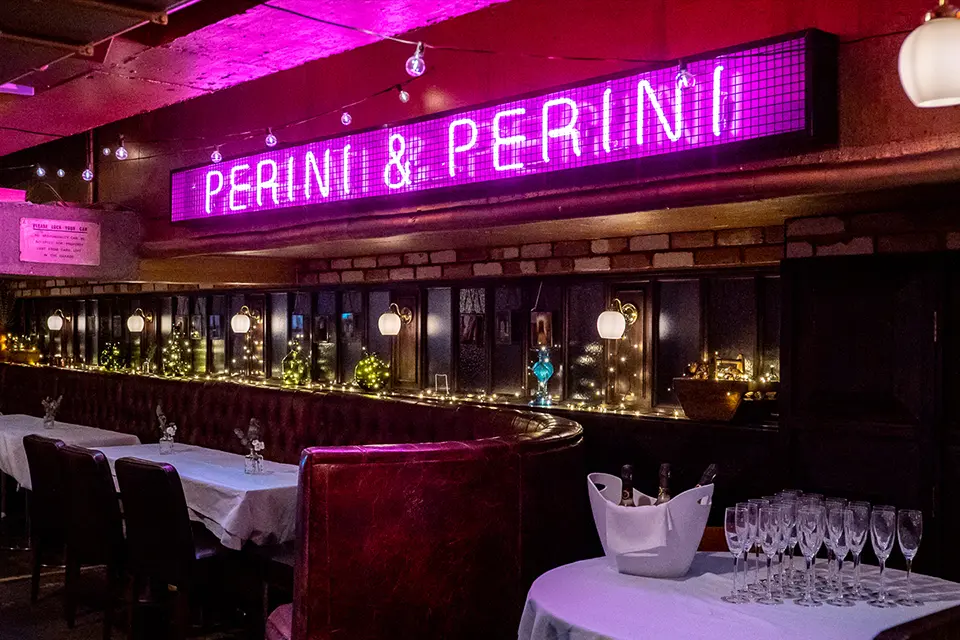 Interior view of Perini & Perini bar and neon sign, Oxford Circus